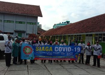 Tanggap Darurat Covid-19 PGRI Kota Tasikmalaya Berbagi Masker Geratis