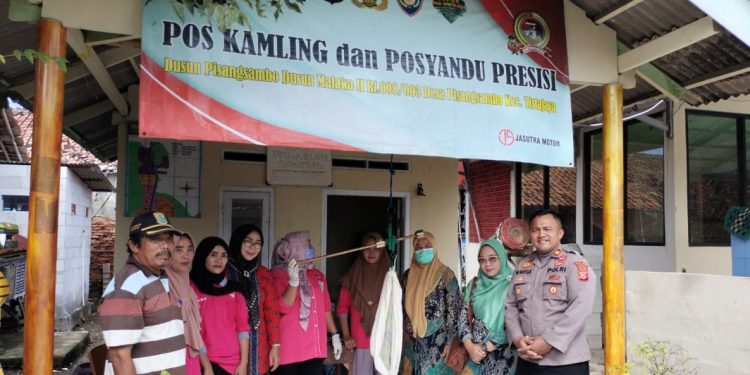 Kapolsek Tirtajaya Laksanakan Monitoring Layanan Posyandu Presisi