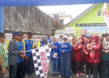 Meriahkan HUT PGRI Ke-78 & HGN 2023, PGRI Cabang Cihideung Kota Tasikmalaya Gelar Jalan Sehat